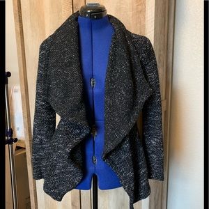 Chic and sophisticated sweater cardigan.